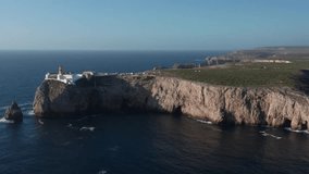 Cape Saint Vincent cliffs and lighthouse drone panning shot