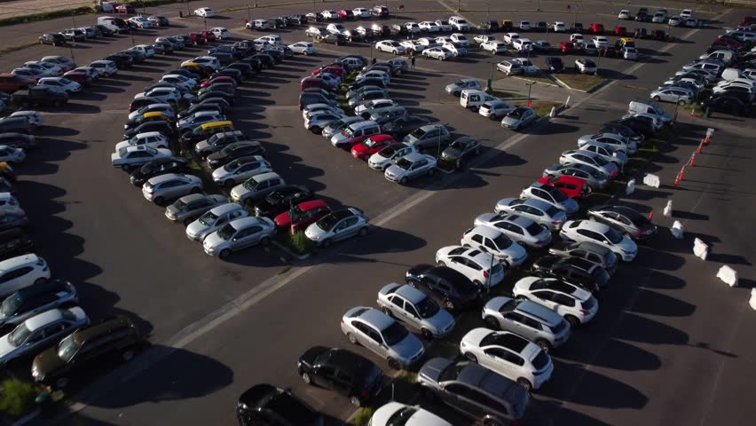 Car parking at racing track, aerial view from copter drone