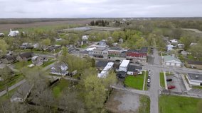 Camden, Michigan downtown with drone video moving forward.