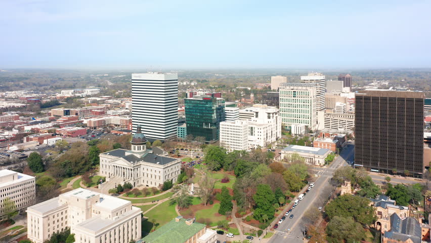 Aerial establishing shot of the South Carolina State House and Columbia skyline. The South Carolina State House is the building housing the government of the U.S. state of South Carolina