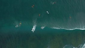 Surfers in Hawaii, Surfer riding and turning with spray on blue ocean wave, surfing ocean lifestyle, extreme sports Aerial Tracking A Surfer Riding A Massive Crashing Wave With Bright Sunlight, - Powered by Shutterstock - Get 15% off with code: PIKWIZARD15