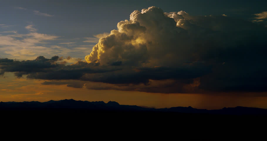 Majestic desert thunderstorm at sunset. Captured in real-time. 