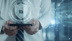 Businessman working with smartphone. Security hologram virtual hud pin with shield and lock. Concept of finance data privacy and VPN service protection. Blockchain and secure crypto wallet background - Powered by Shutterstock - Get 15% off with code: PIKWIZARD15