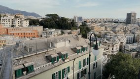 Video of Genoa with Piazza De Ferrari with fountain, San Lorenzo Cathedral, Porto Antico, narrow alleys, Annunziata, Royal Palace, Via Garibaldi, Spianata Castelleto with sunset. 