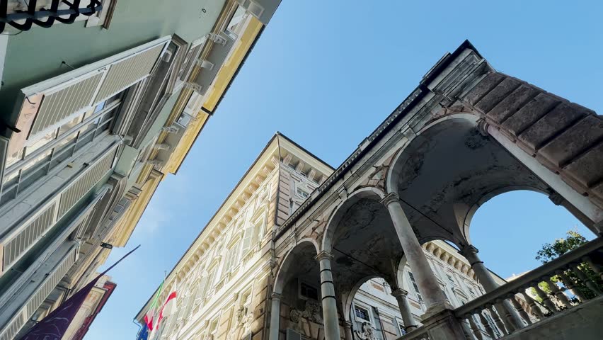Video of Genoa with Piazza De Ferrari with fountain, San Lorenzo Cathedral, Porto Antico, narrow alleys, Annunziata, Royal Palace, Via Garibaldi, Spianata Castelleto with sunset. 