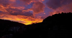 aerial view Bright orange-red clouds, bright and beautiful beyond imagination. The sky is amazing colored above the mountain peak.
Majestic sunset or sunrise landscape Amazing light of nature.