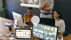 Animation of network of digital icons over diverse team of photographers discussing at studio. Global networking and creative business technology concept - Powered by Shutterstock - Get 15% off with code: PIKWIZARD15