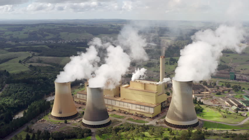 Coal-fired power station in Yallourn, LaTrobe Valley, Victoria, Australia, aerial establishing shot of historical thermal generator, legacy electricity infrastructure, and fossil-fuels pollution.