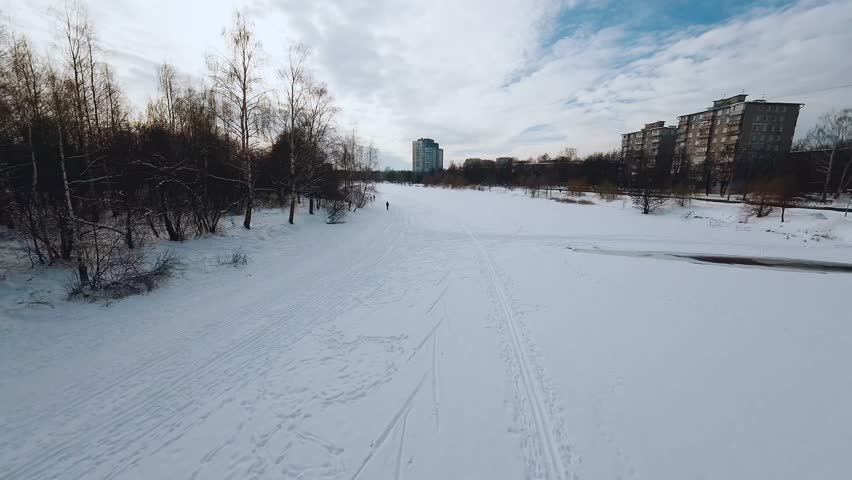 Nizhny Novgorod, Russia, February 13, 2023.  FPV shooting of skiers, aerial shooting of skiers, cross-country skiing