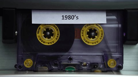 Inserting and Playing Audio Cassette Tape With 1980's Music Compilation, Close Up: film stockowy