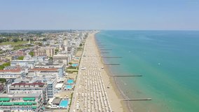 Inscription on video. Italy, Jesolo. Lido di Jesolo, or Jesolo Lido, is the beach area of the city of Jesolo in the province of Venice. Lightning strikes the letters, Aerial View
