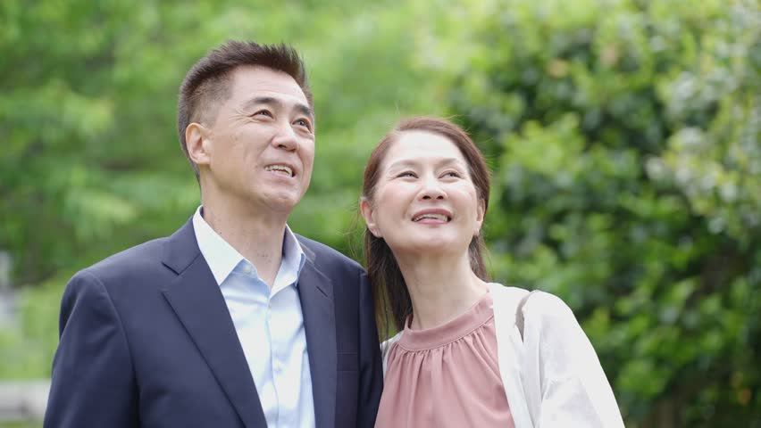 Asian senior couple at a park Royalty-Free Stock Footage #1103765173