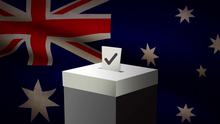 Casting vote into the ballot box during Australia election