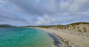 Time Lapse of Traigh a Bhaigh beach with cloud cover, Vatersay, Barra Island, Scotland, UK