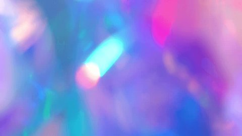 A holographic rainbow iridescent pastel purple pink teal blue colors abstract background : vidéo de stock