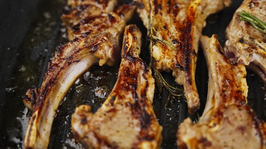 Grilled Lamb Chops with Rosemary and lemon Royalty-Free Stock Footage #1103799449