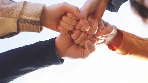 business teamwork. fist crowd group people. business team work together concept. group of people put their fist together teamwork. team union concept. a group put their fists together close-up Video stock