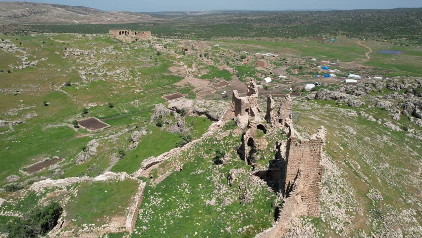 
Idil village, Bahnim hamlet, a historical village where Yazidi people live, traces of stone houses, mir palace Royalty-Free Stock Footage #1103810545