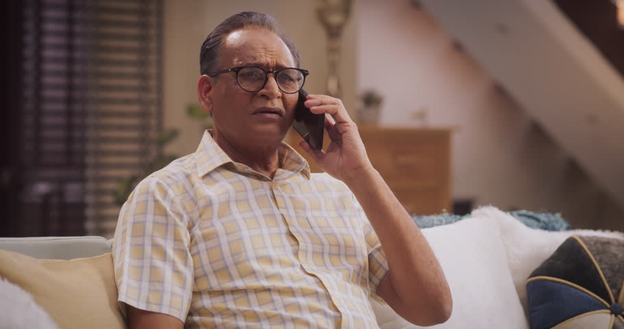 Elderly Man Using Phone, Calling and Talking: Reconnecting with Old Friends and Sharing Life Updates Remotely with Family. Old Person having Meaningful Conversations. Medium Close-up Slow motion Royalty-Free Stock Footage #1103811907