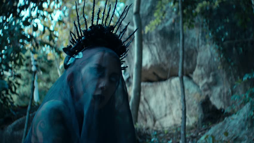 Portrait of woman as witch. halloween, cosplay. High quality 4k footage