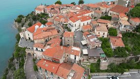 This aerial drone video shows the old city of Agropoli, in southern Italy. The old city center can be found on top of a cliff and you have a beautiful view over the Mediterranean sea. 