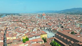 Aerial view of Basilica of Santa Croce in Florence in Florence in ProRes 4K. Drone footage of Piazza di Santa Croce and colourful traditional Tuscany houses in the heart of Florence in Italy, Europe.
