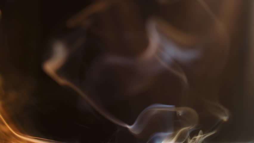Macro close up smoke trails, dark background. Slow motion 4K Royalty-Free Stock Footage #1103824723