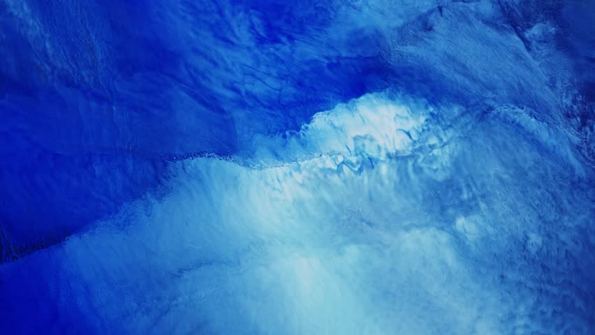 Fluid art. Abstract background with effect sea waves. Backdrop similar to the landscape of the ocean. Liquid artistic texture motion with blue and white colors. Royalty-Free Stock Footage #1103830859