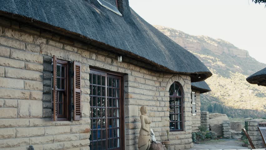 Travel hostel house with mountain background in Africa
