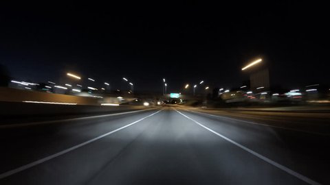 Night driving time lapse of the San Diego 405 and Santa Monica 10 Freeways in Los Angeles, California.