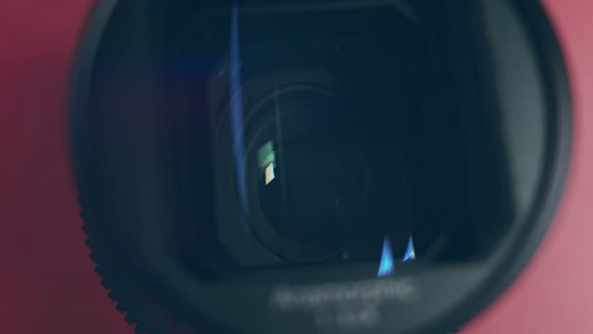 Contour and smoke of Focusing lens of digital camera. The Lens Of The Camera. Close-Up. Camera Focus Focusing And Shooting. Concept of proffesional service for photographic or filmmaker equipment