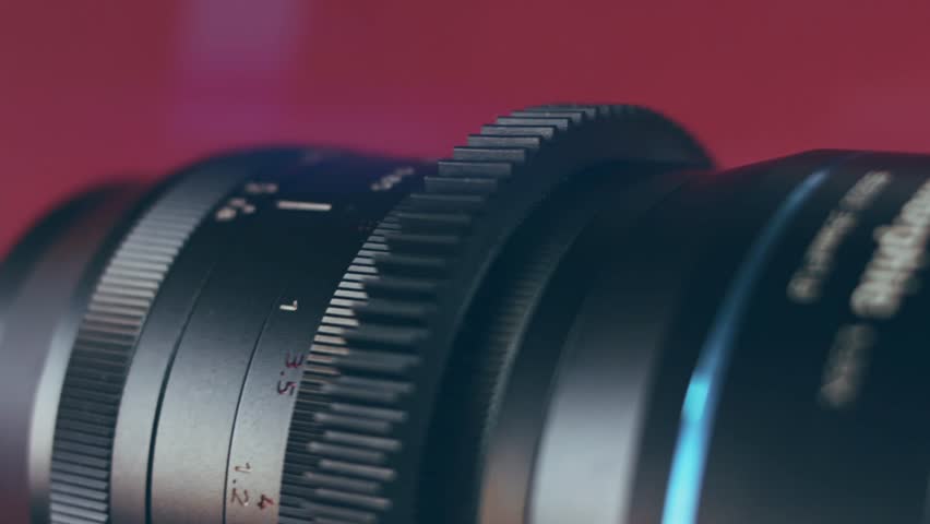 Contour and smoke of Focusing lens of digital camera. The Lens Of The Camera. Close-Up. Camera Focus Focusing And Shooting. Concept of proffesional service for photographic or filmmaker equipment