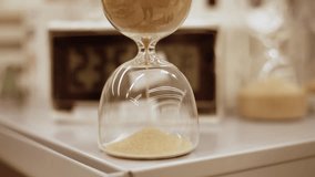 An elegant and futuristic hourglass with a digital clock background creates a striking visual. Advertise this video for technology, time-management, or productivity - Powered by Shutterstock - Get 15% off with code: PIKWIZARD15