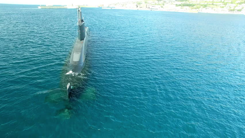 Army, drone and travel with submarine in ocean for transportation, war and underwater technology. Military, metal and cruise with marine boat vessel sailing in sea for naval, armed forces and stealth