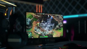 Professional team playing the strategy game championship. Esports team strategically attacking the enemy characters in the MOBA game. Team Displaying skill and strategy in a computer game.