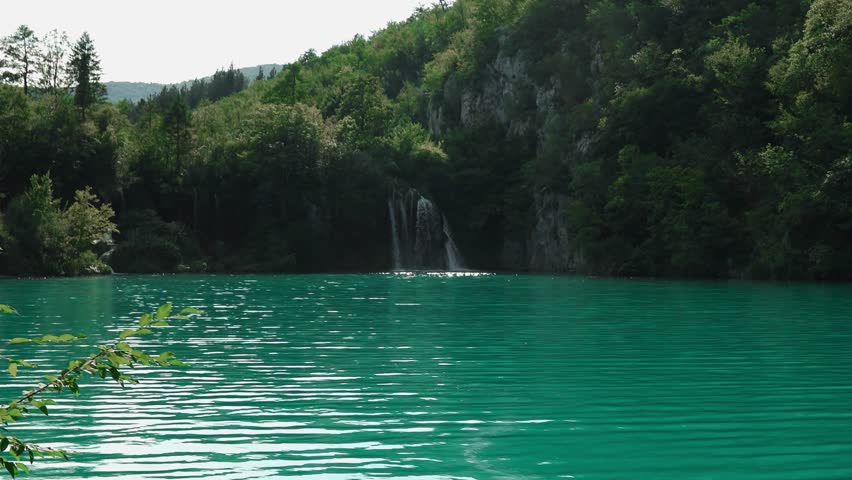 Plitvice Lakes National Park in Croatia. Reserve Plitvice Lakes. High content of calcium carbonate. National park in Croatia. A cascade of 16 lakes connected by waterfalls and a limestone canyon.