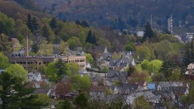 Valley town perfect spring weather Bradford Pa moving clouds natural light 4k resolution clip