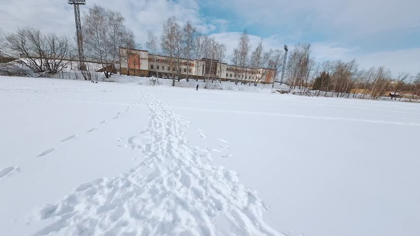 Nizhny Novgorod, Russia, February 13, 2023.  FPV shooting of skiers, aerial shooting of skiers, cross-country skiing
