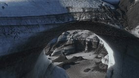 Flying Through Ice Cave Tunnel On A Sunny Day In Kotlujokull Glacier, South Iceland. - aerial - Powered by Shutterstock - Get 15% off with code: PIKWIZARD15