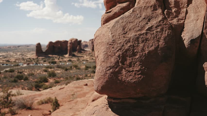 Enjoy the magnificent panoramic view of the breathtaking Arches National Park in Utah. Marvel at the stunning red rock formations and vast desert landscape. Shot in 4K with Sony A7S III and Dji RS2.
