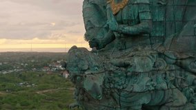 Garuda Wisnu Kencana statue. GWK 122-meter tall statue is one of the most recognizable and popular attractions of island Bali, Indonesia. 4K UHD Aerial Video Clip