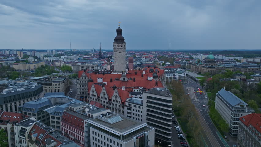 Drone shot of Leipzig New Town Hall ( Neues Rathaus ) at dusk , it is the seat of the Leipzig city administration since 1905. It stands in Leipzig