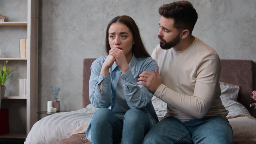 Couple quarrel family problem breakup misunderstanding conflict divorce Caucasian man husband guy calming crying sad woman wife girl feel guilty say sorry apologize ask forgiviness supporting at home Royalty-Free Stock Footage #1103873305