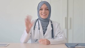 Portrait of Muslim Female Doctor Doing Online Video Chat
