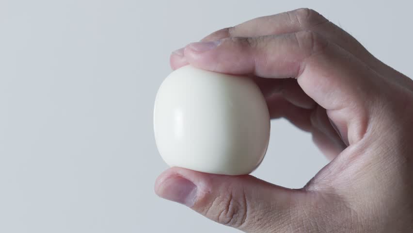 Kneading a boiled egg with a hand, Skin care or make up image, Protein or health, Nobody Royalty-Free Stock Footage #1103885047