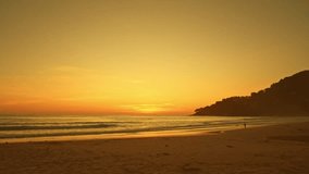 
golden sky in sunset above the sea.
aerial view golden sky in sunset above the sea video 4K. Nature video High quality footage. 
Scene of Colorful romantic sky sunset with orange color of the sky bac