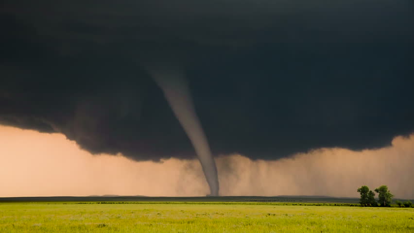 Classic Tornado Dark Storm Base Slowly Moving Across Beautiful Montana Farmland. A picture perfect, classic tornado slowly moves across open country side in eastern Montana. Royalty-Free Stock Footage #1103894821