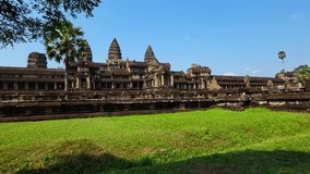 Ancient ruins Angkor Wat temple - famous Cambodian landmark. Siem Reap, Cambodia. Timelapse.