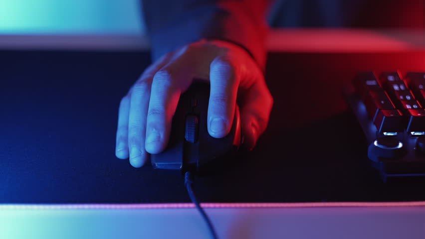 Clicking mouse. Choosing option. Hand of man pressing button seamless loop surfing internet using computer mouse online gaming working pc dark light. Royalty-Free Stock Footage #1103902463