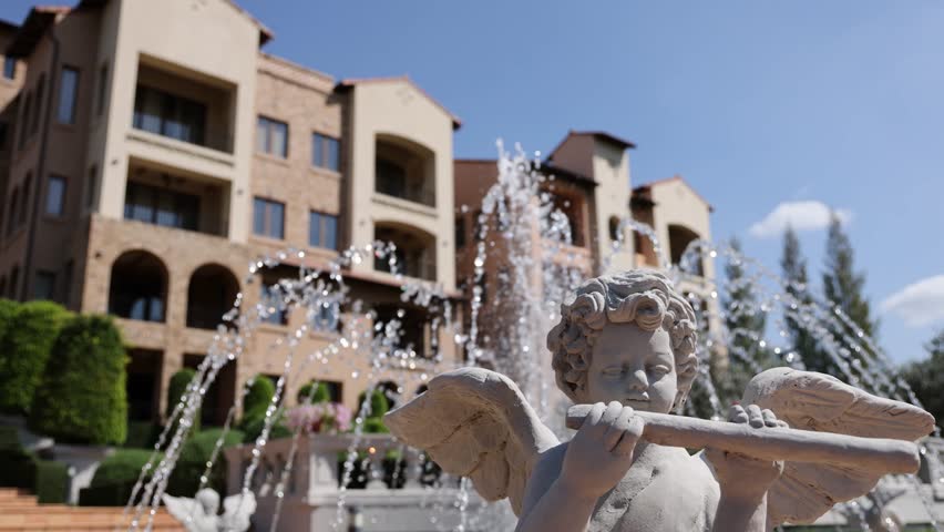 Cupid Statue Adorned at a Beautiful Fountain Royalty-Free Stock Footage #1103935385